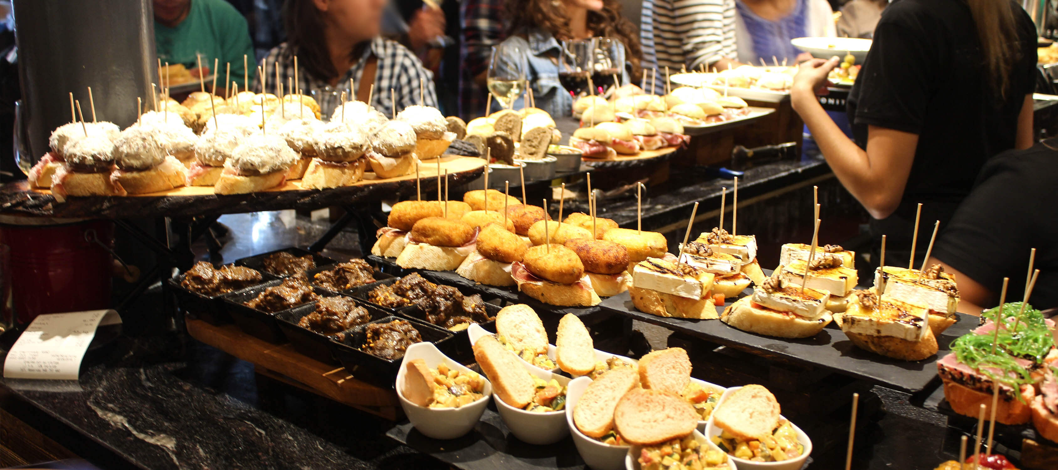 Tapas and pinchos : spanish appetizers at cocktail hour in Barcelona.